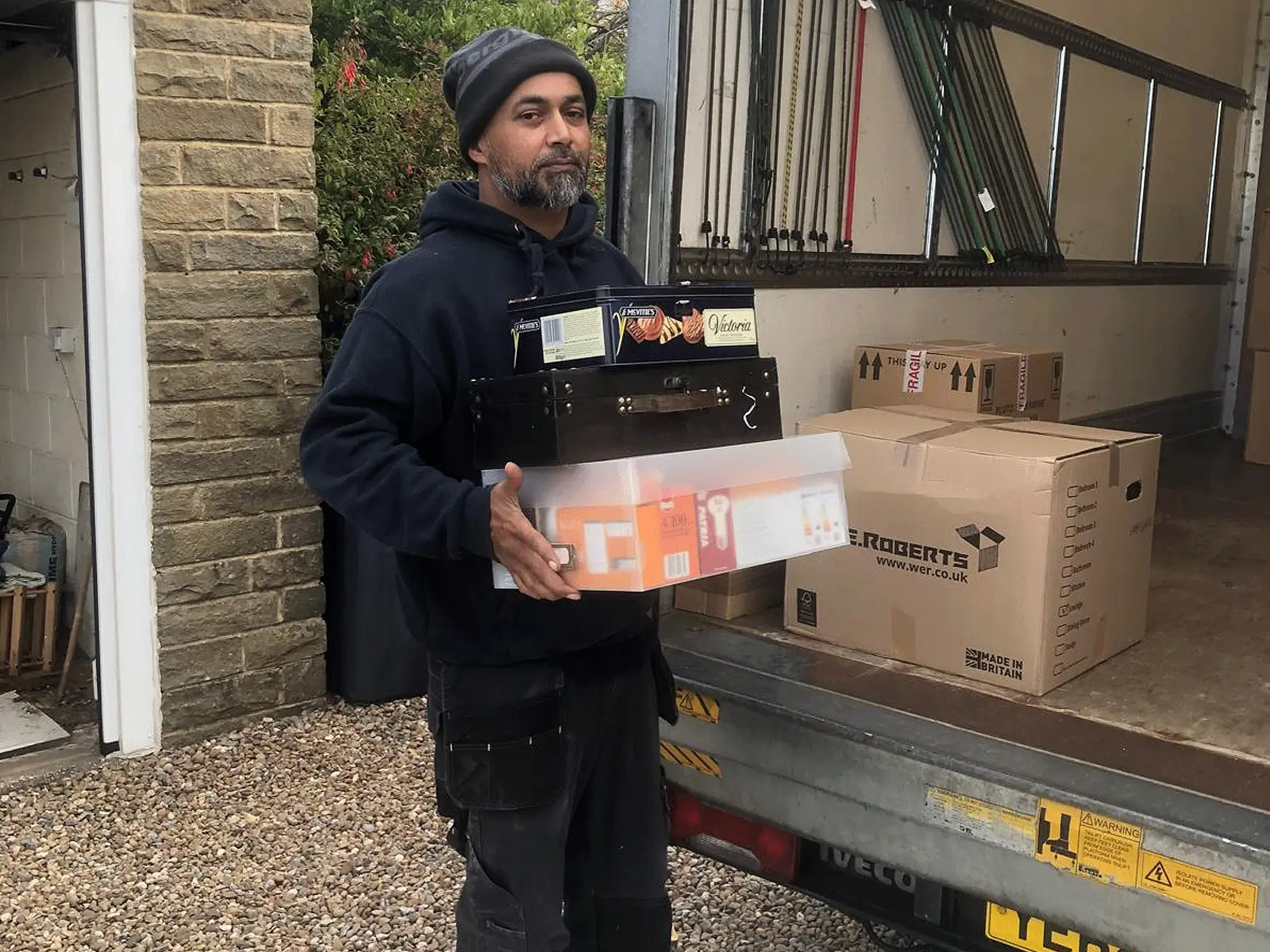 On The Move Removals packed moving boxes labelled and ready for collection in Huddersfield