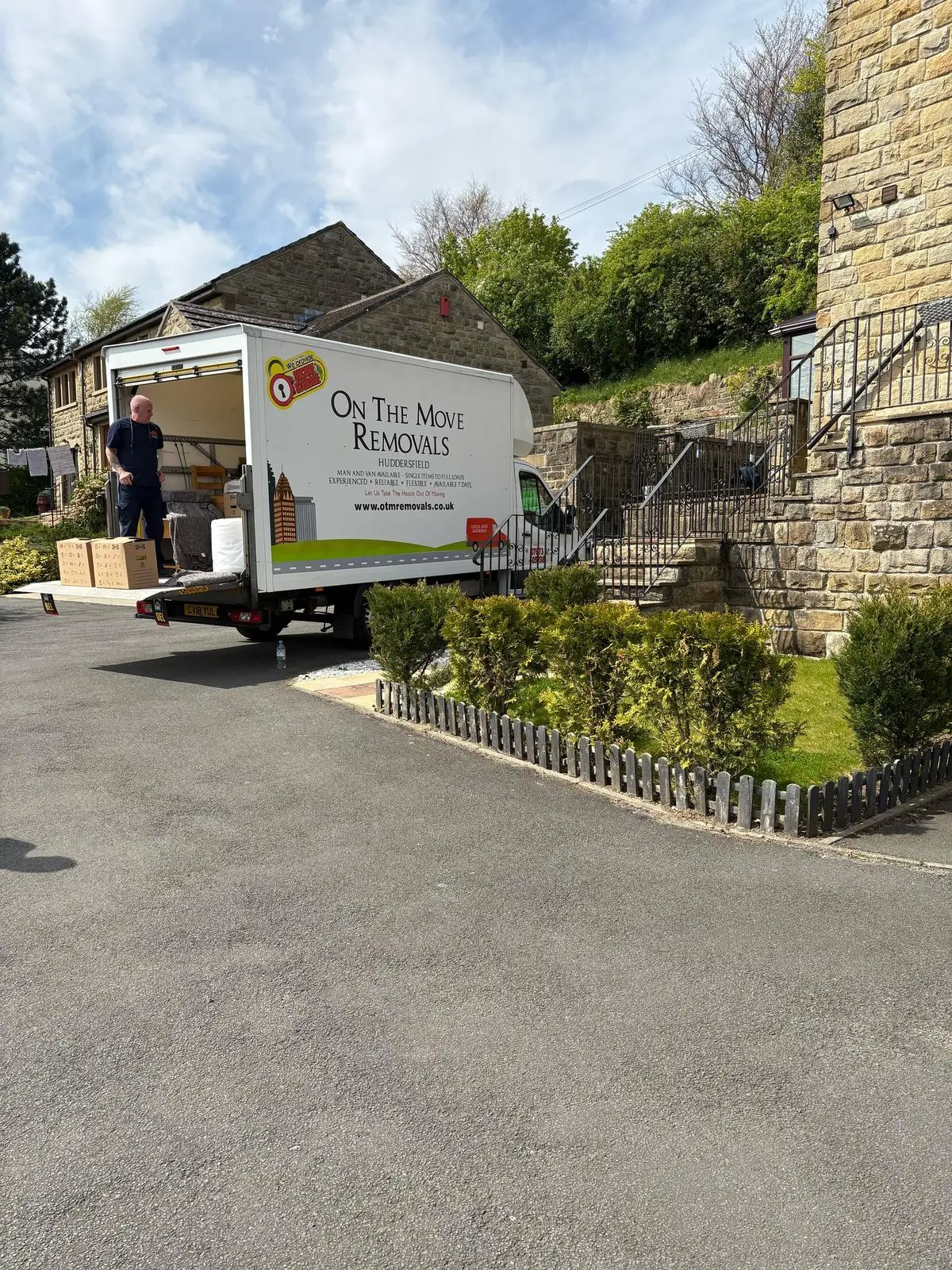Shaun from On The Move Removals on the van tailgate, ready for a Huddersfield moving day