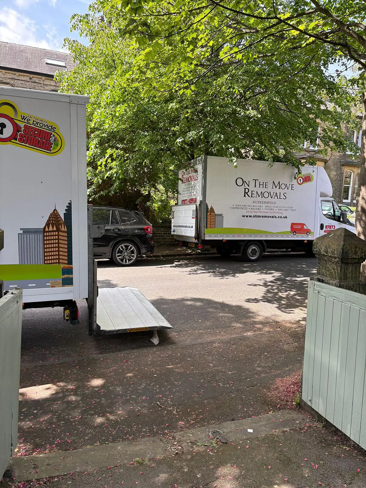 Two On The Move Removals vans parked up on a large Huddersfield removal job